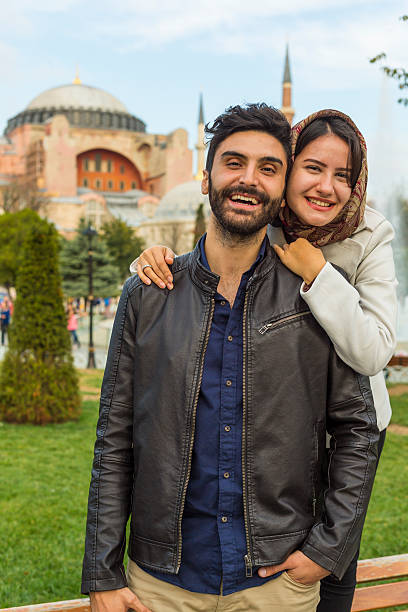 istock Young Muslim Couple at Hagia Sofia, Istanbul, Turkey 529078613