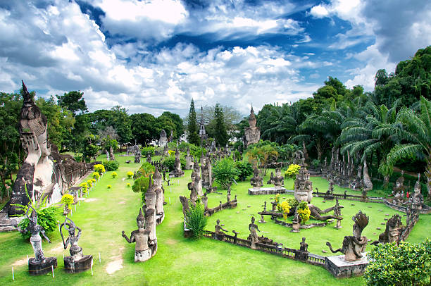 Buddha park in Vientiane, Laos. Buddha Park, also known as Xieng Khuan, is a sculpture park located 25 km southeast from Vientiane, Laos in a meadow by the Mekong River. laos photos stock pictures, royalty-free photos & images