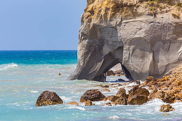 istock Rock with cave in sea at greek coast 529079556