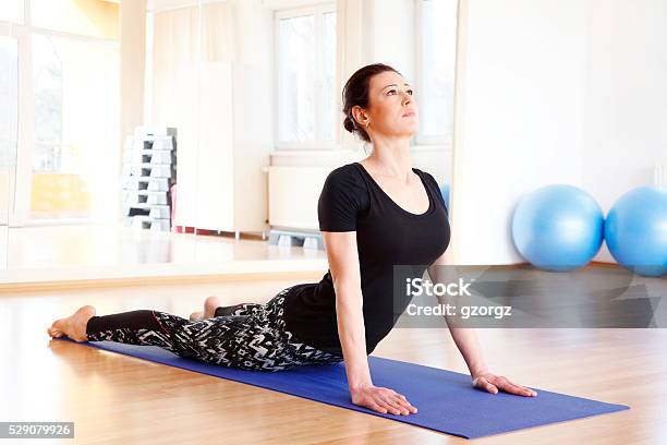 Yoga Stock Photo - Download Image Now - 30-39 Years, 40-49 Years, Active Lifestyle