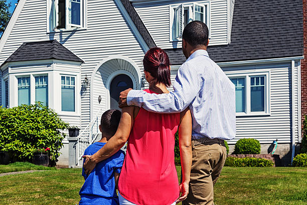 istock Happy Young Family Admiring Home 529080217