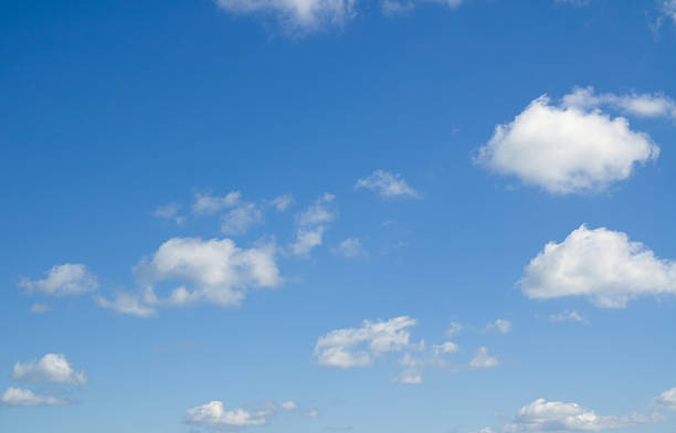 istock Heaven. White heap clouds in the blue sky. 529080326