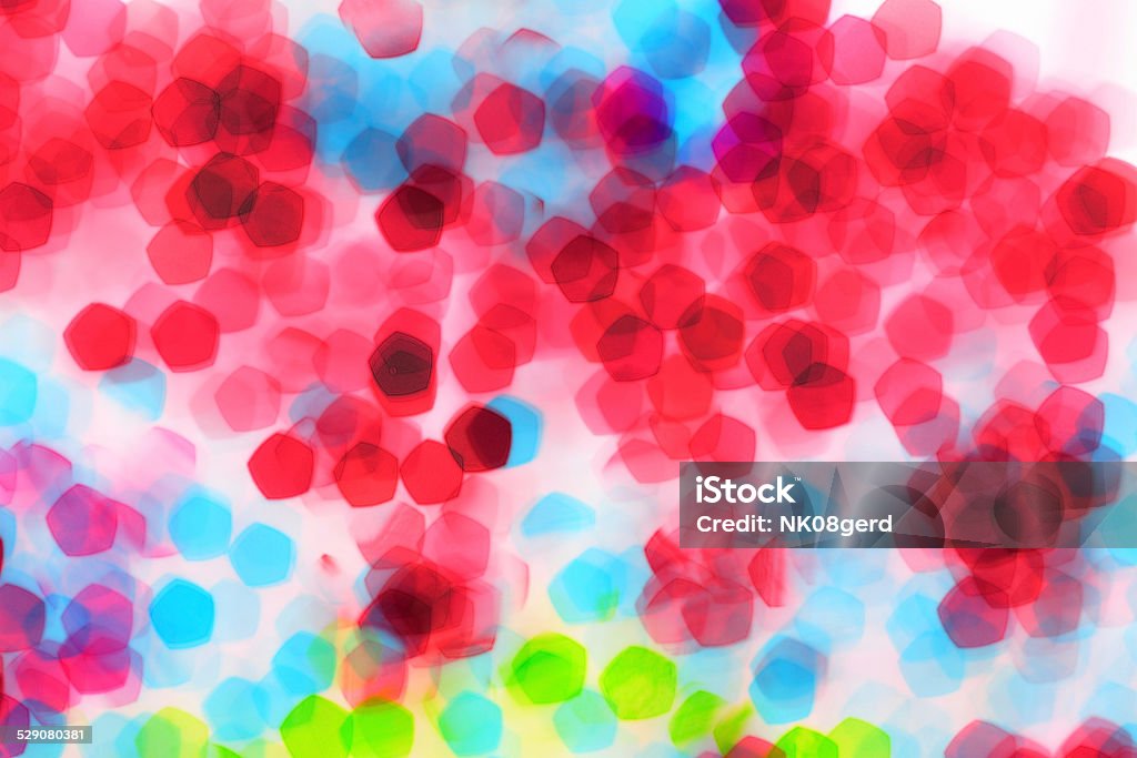 Colorful defocused bokeh lights background. Colorful defocused bokeh lights background. Festive background with natural bokeh. Abstract Stock Photo