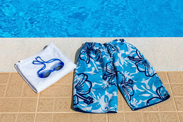 Rolled towel placed on the bed in the pool.