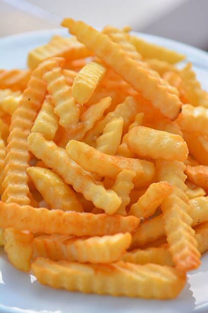 istock French Fries on white dish 529082837
