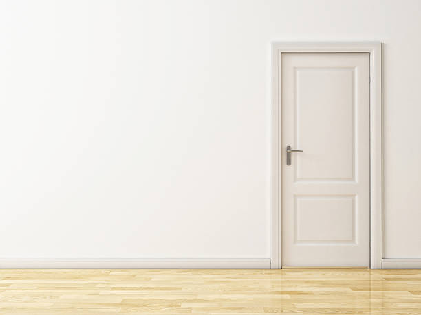 istock Closed White Door on White Wall, Wooden Reflective Floor 529082931