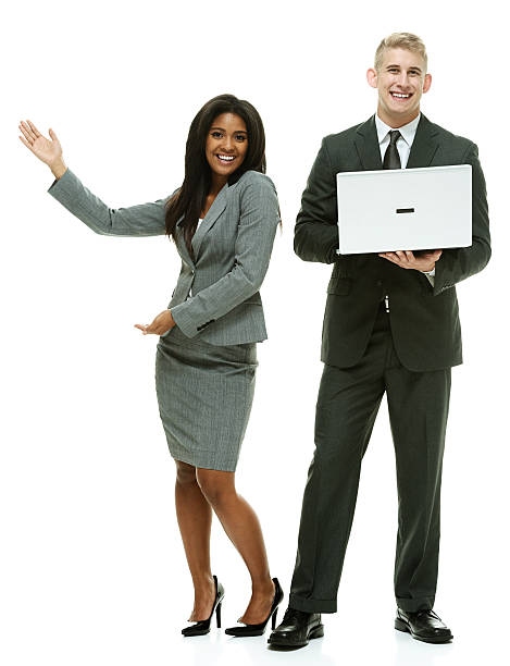 istock Cheerful business couple presenting & holding laptop 529086159