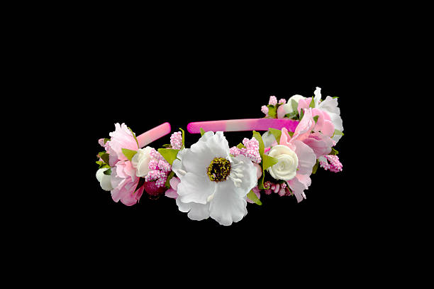 head band decorated with flowers isolated over black