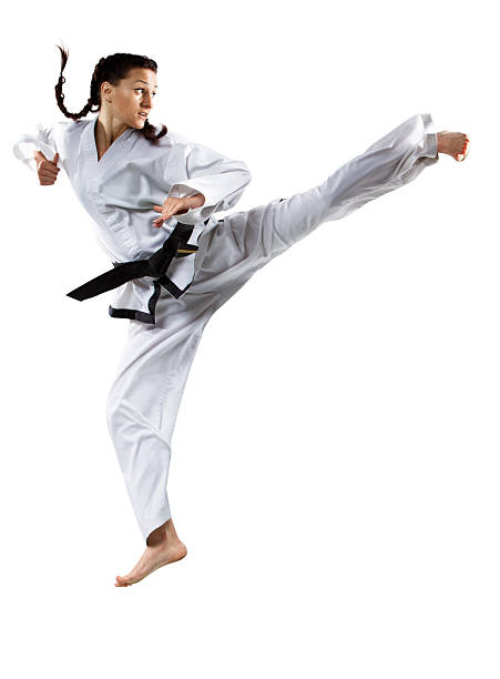 istock Professional female karate fighter isolated on white 529097073