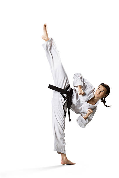 istock Professional female karate fighter isolated on white 529097079