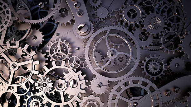 istock metal cogwheels a clockwork. Macro, extreme closeup clock mechanism 529098547