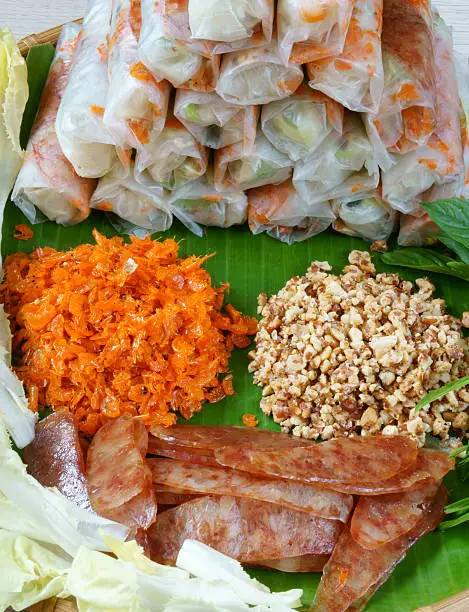 Vietnamese food, bo bia is street food, snack that delicious, cholesterol free, make from dried small shrimp, vegetables, sausage, peanut in rice paper roll, sauce, Bobia is popular snack in Vietnam