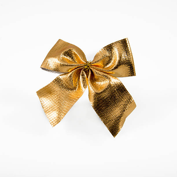istock Golden bow isolated on white background. 529103357