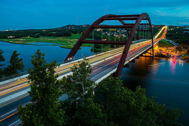 istock Penny Backer Bridge 360 Bridge After Sun down Light Streaks 529112679