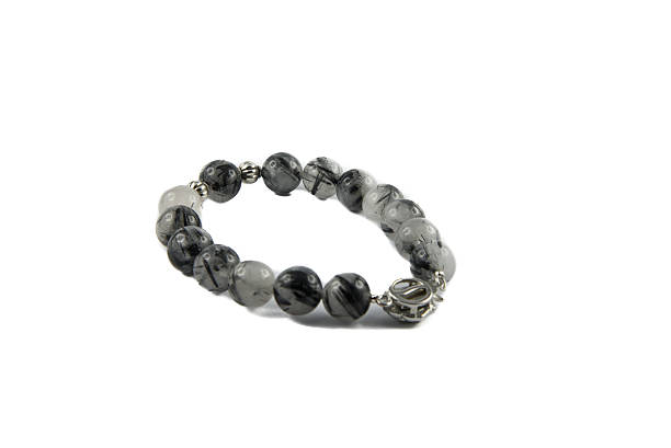 istock Black Rutile Bracelet  isolated on white background 529112703