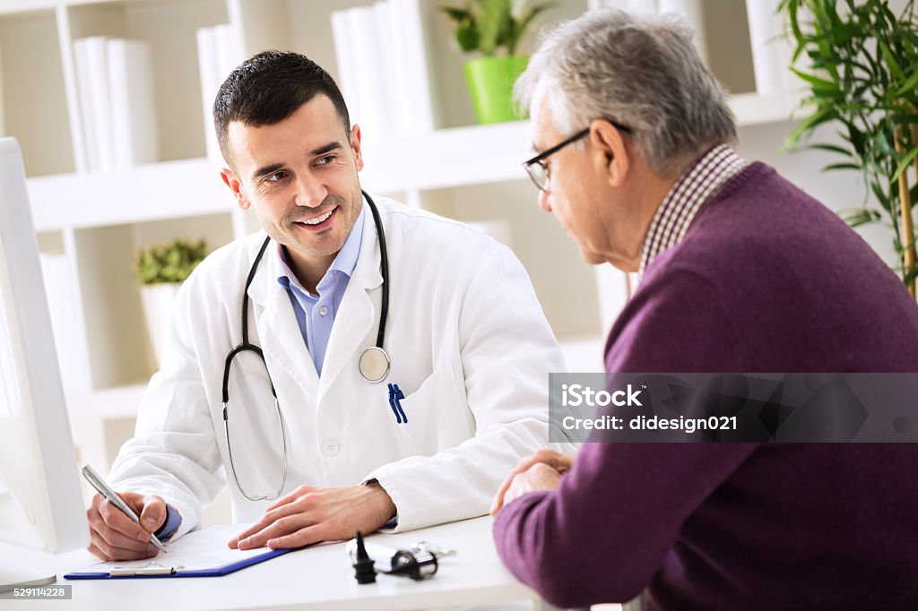 Doctor explaining prescription to senior patient Doctor explaining prescription to senior patient, healthcare concept Doctor Stock Photo