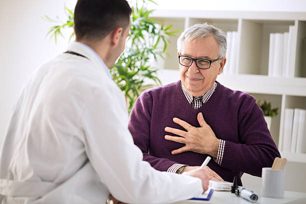 istock Sick old man visit doctor specialist 529114972
