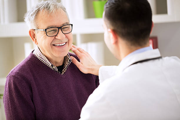 Smiling happy patient visit doctor Smiling happy old patient visit doctor general practitioner photos stock pictures, royalty-free photos & images