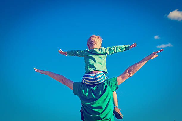 istock happy family on sky 529115331