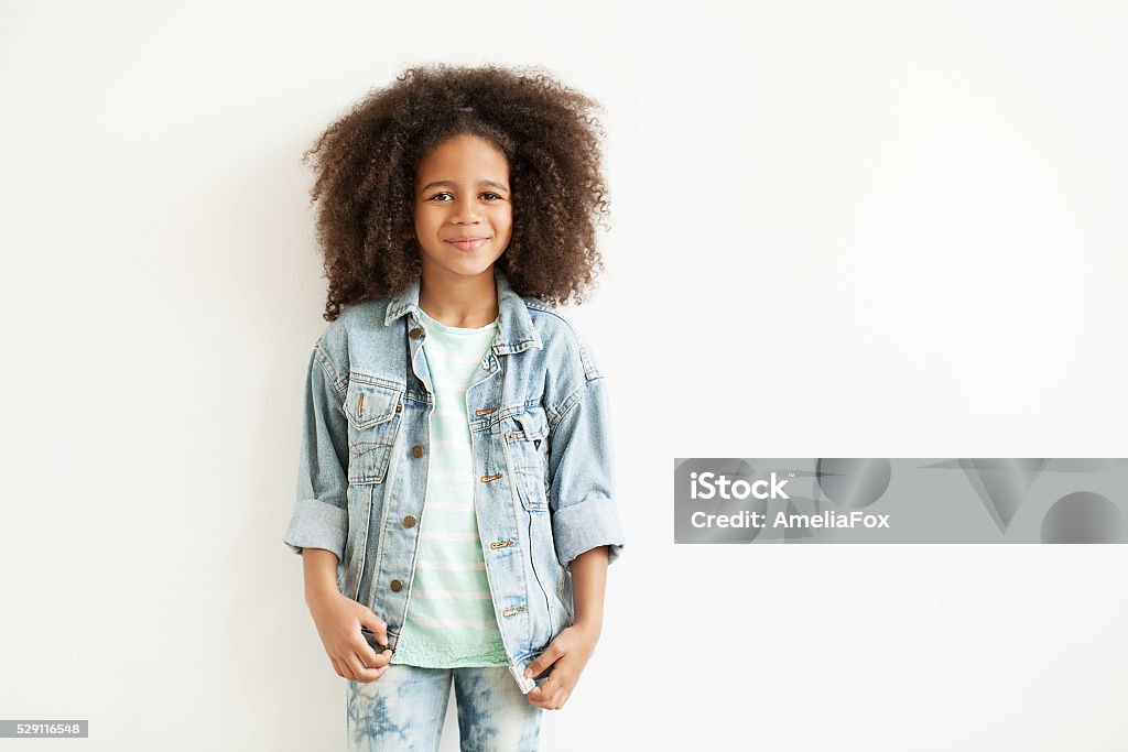 Beautiful stylish little girl Beautiful stylish little girl in jean jacket Child Stock Photo