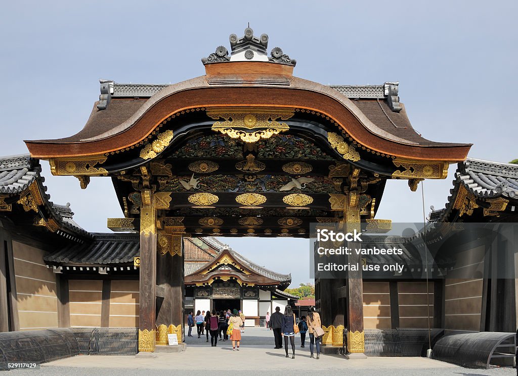 Entrance gate of Nijo Castle Kyoto, Japan  November 8, 2014: Tourists at the entrance gate of Nijo Castle. This an UNESCO World Heritage site and built in 1626. November 8, 2014 Kyoto, Japan Nijo Castle Stock Photo