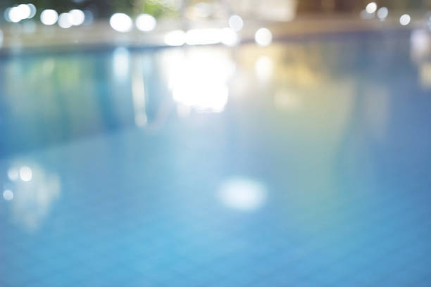Abstract swimming pool at night , colorful and blur concept for background