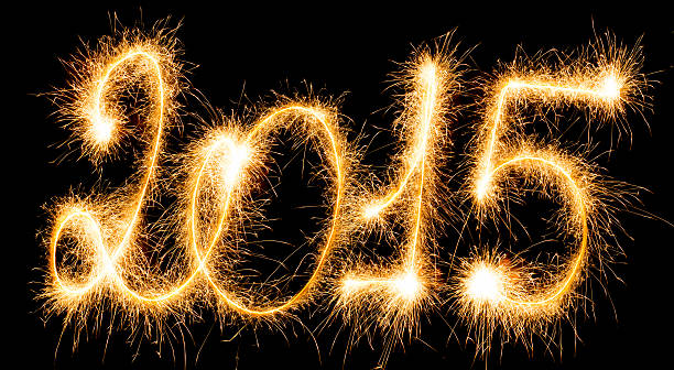 istock Happy New Year - 2015 with sparklers 529119285