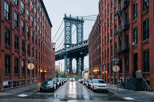 manhattan bridge in new york  - empire state building urban scene new york state new york city stock-fotos und bilder