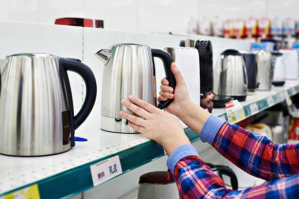 istock Buyer shopping for electric kettle 529119714