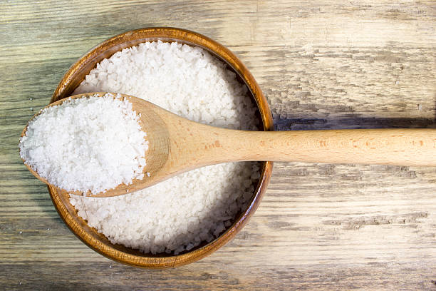 istock Large sea salt on wooden background 529121078