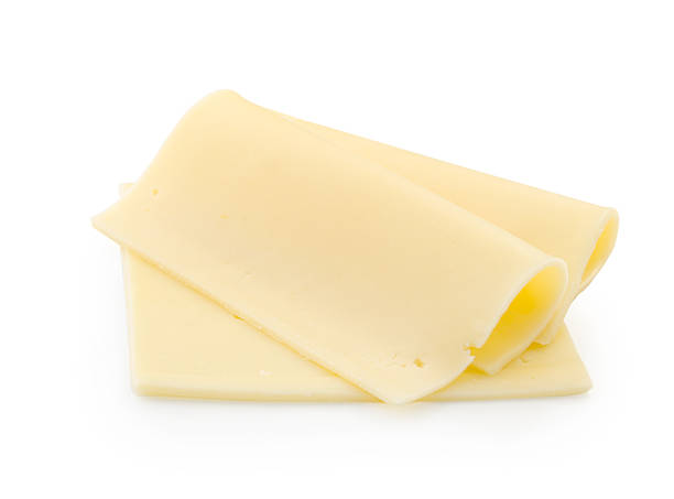 istock slices of cheese on white background with clipping path 529122930
