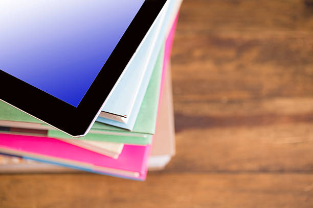 istock Back to school. Education. Textbooks, digital tablet on desk. Chalkboard. 529123244