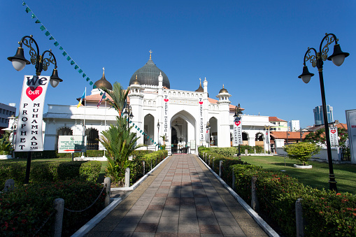 Georgetown, Penang Island, Malaysia - January 6, 2016: The Kapitan Keling Mosque is a mosque built in the 19th century by Indian Muslim traders in George Town, Penang, Malaysia. It is situated on the corner of Lebuh Buckingham (Buckingham Street) and Jalan Masjid Kapitan Keling (Pitt Street). Being a prominent Islamic historic centre, it is part of the UNESCO World Heritage Site of George Town