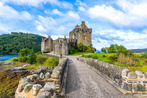 Eilean Donan Island, United Kingdom - August 20, 2014: The Eilean Donan castle in Scotland. This castle, frequently appears in film and television, was founded in the thirteenth century.