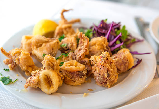 fried calamari plate as appetizer dish at thassos island kavala greece