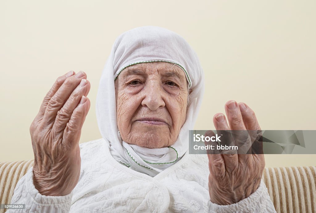 Senior Woman Praying Stock Photo - Download Image Now - Indigenous Culture,  Senior Women, White Color - iStock