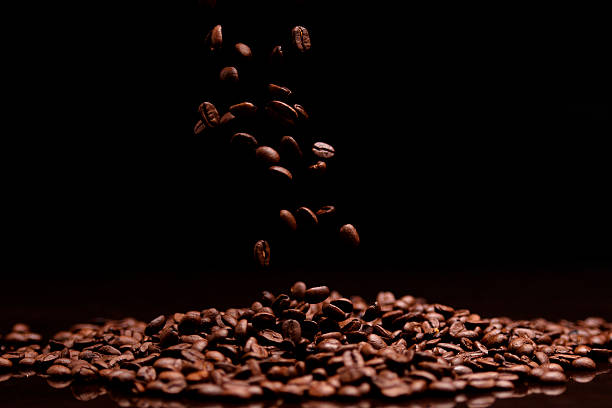 istock High contrast image of coffee beans. 529129011
