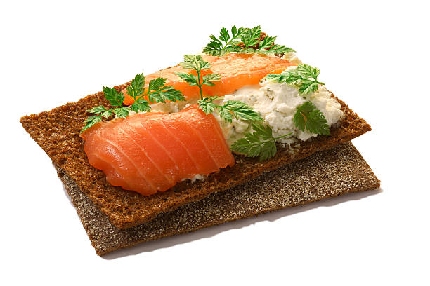 istock Bread crisp with salmon, soft cheese and chervil 529130008