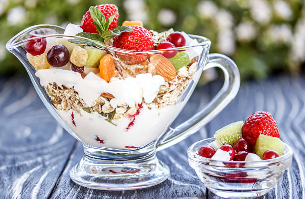 istock Fruit salad closeup with berries, yogurt 529131306