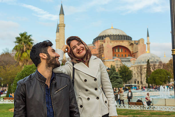 istock Young Muslim Couple at Hagia Sofia, Istanbul, Turkey 529131609