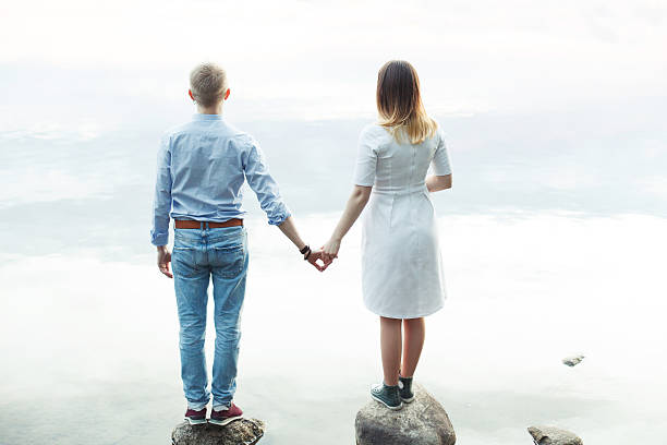 istock Couple in love on the beach 529131616