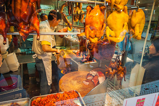 シェフ作成の肉と鳥肉ストリートカフェ」は、中国香港 - store market china city street ストックフォトと画像