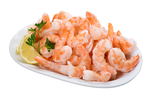 A plate full of prepared prawns,isolated on white background with clipping path.
