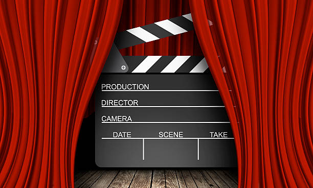 istock Movie clapperboard on a red 529136466