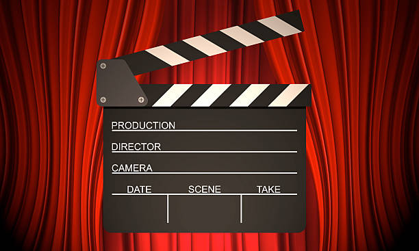 istock Movie clapperboard on a red 529136636