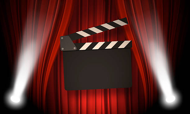 istock Movie clapperboard on a red 529138728