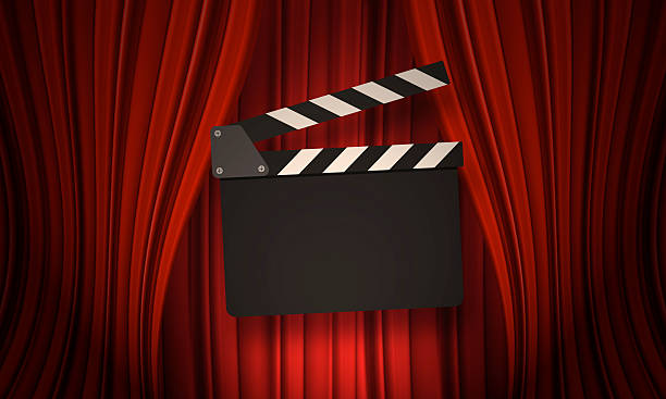 istock Movie clapperboard on a red 529138900