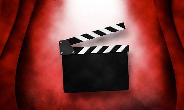 istock Movie clapperboard on a red 529139332