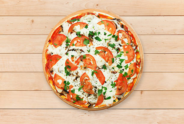 istock Delicious pizza with mushrooms and meat 529143804