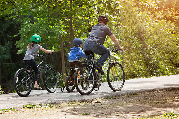 1,600+ Family Bike Ride Neighborhood Stock Photos, Pictures & Royalty ...